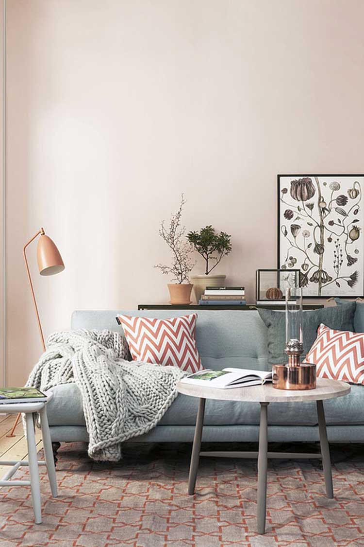 Wrose-quartz-serenity-living-room-with-rug-pillows